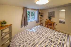 Twin beds in bedroom 3 a No 8 Sandhills can be made as a king on request. The beds are small singles
