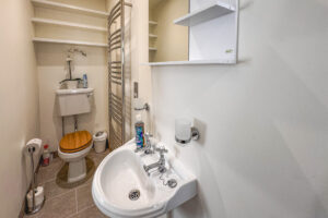 Bathroom 2 which is the ensuite for Bedroom 1 picture showing toilet and wash hand basin at No 8 Sandhills