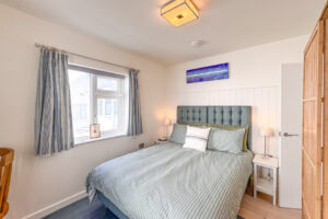 Ensuite master bedroom 1 with king bed at No 8 Sandhills with ensuite