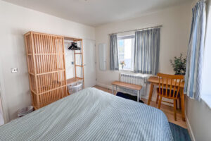 Ensuite master king bedroom at No 8 Sandhills with hanging space