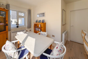 Dining area at No 8 Sandhills with table and chairs