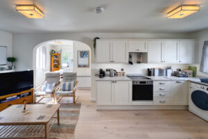 Open plan kitchen and lounge area at No 8 Sandhills