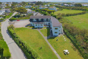 Aerial view of the apartments adjacent to No 8 Sandhills looking inland with the village in the background