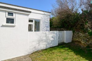 Side gate to paved area to rear of No 8 Sandhills