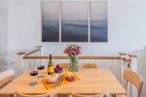 Table and chairs for 6 in open plan living-kitchen at No 2 Treglos