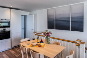 Table and chairs for 6 in open plan living-kitchen at No 2 Treglos
