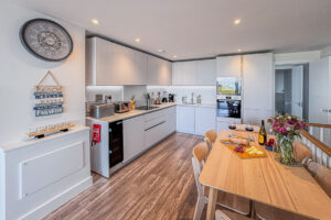 Fully equipped kitchen and dining space at No 2 Treglos
