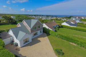 Exterior aerial view over Whitehaven with countryside and ocean in the distance