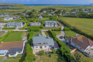 Aearial view over Whitehaven and nearby properties with views over the golf course towards the ocean