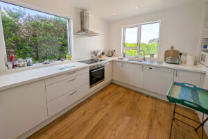 Kitchen at Whitehaven with windows to the front and side of the house