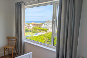 View to front of house towards Trevose Head from the first floor twin room at Whitehaven