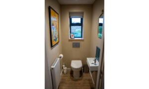 Ground floor cloakroom 1 at Iona with toilet and wash hand basin