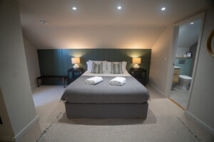 First floor ensuite bedroom 3 at Iona featuring a king bed