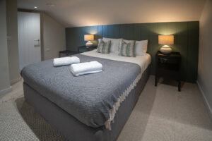 First floor ensuite bedroom 3 at Iona featuring a king bed