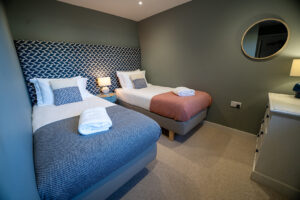 Ground floor bedroom 5 at Iona with twin beds