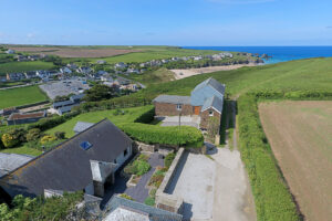 Aerial view of the front and parking at Iona