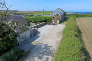 Lane to the front of Iona and parking